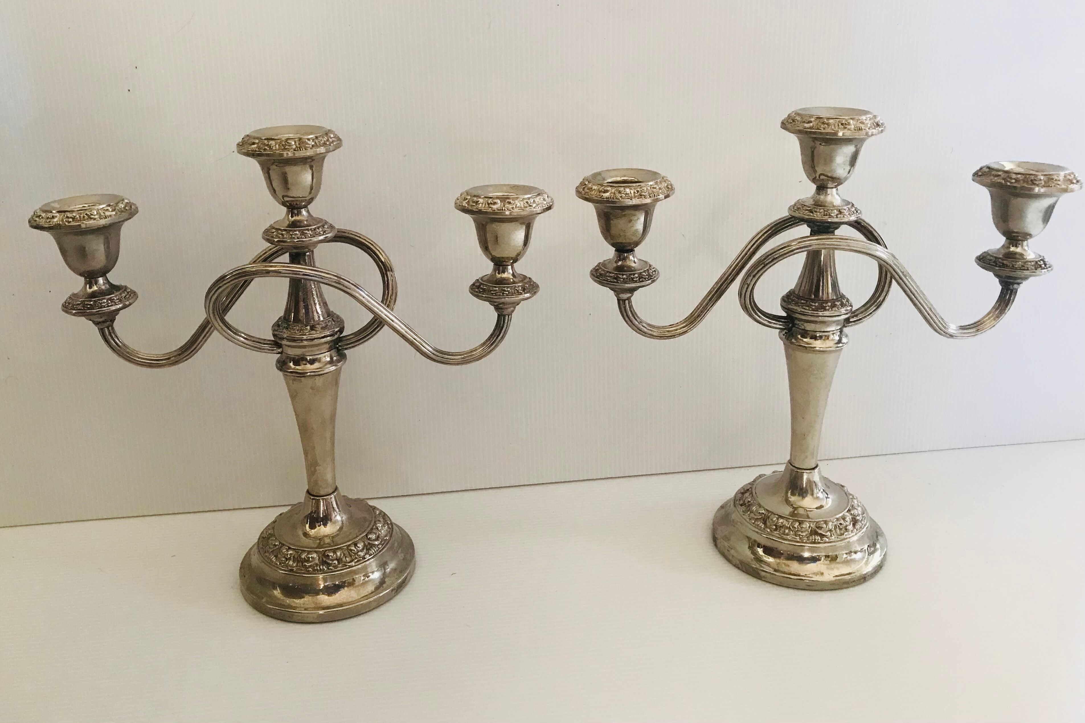 Pair of silver metal chandeliers