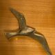 Set of two brass birds to hang