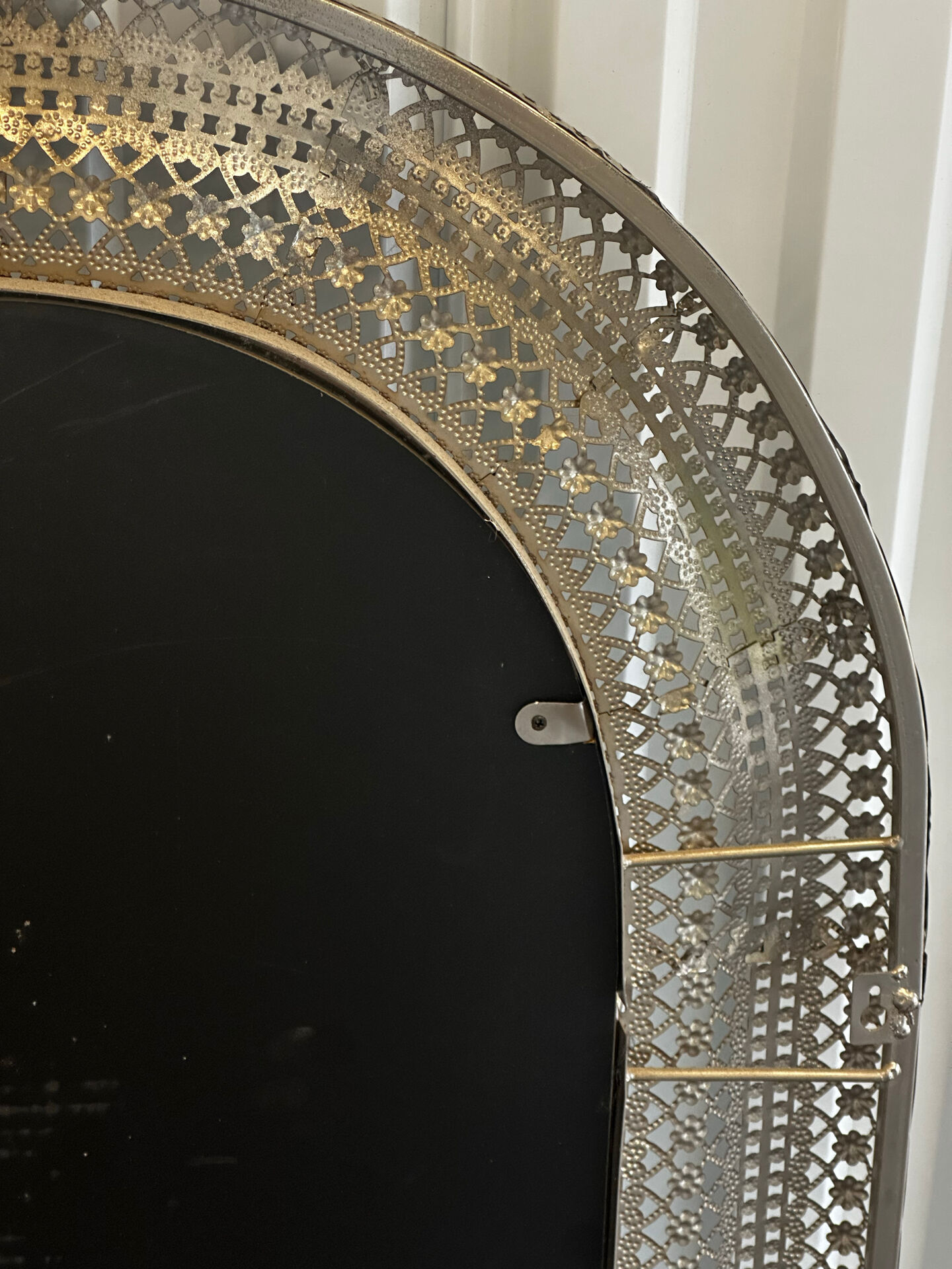 Large oriental mirror in pierced metal - H 116 cm