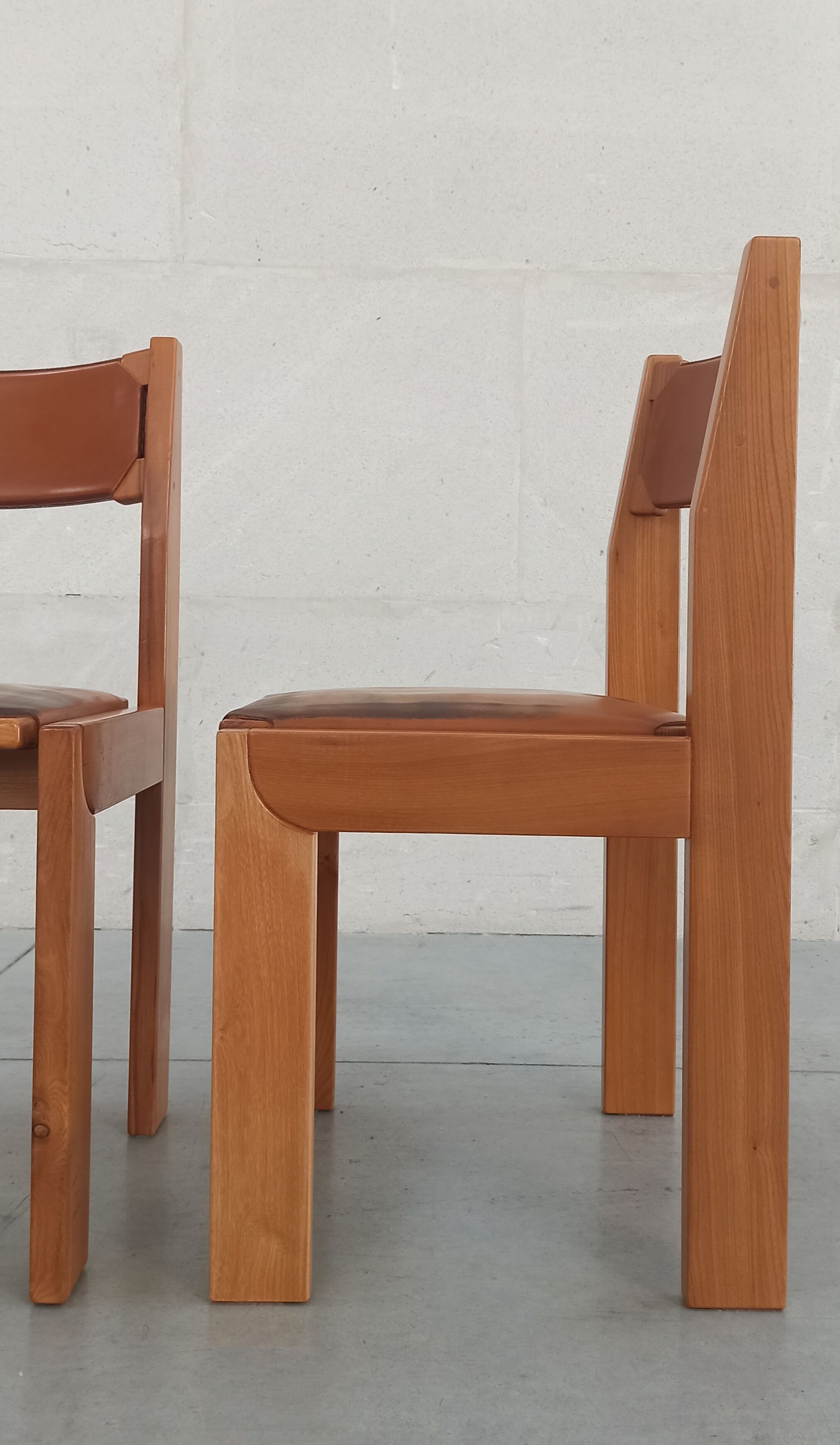 Elm and leather chairs, 80