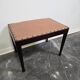 Vintage wooden ottoman from the 1940s with a silk top and studded trim.