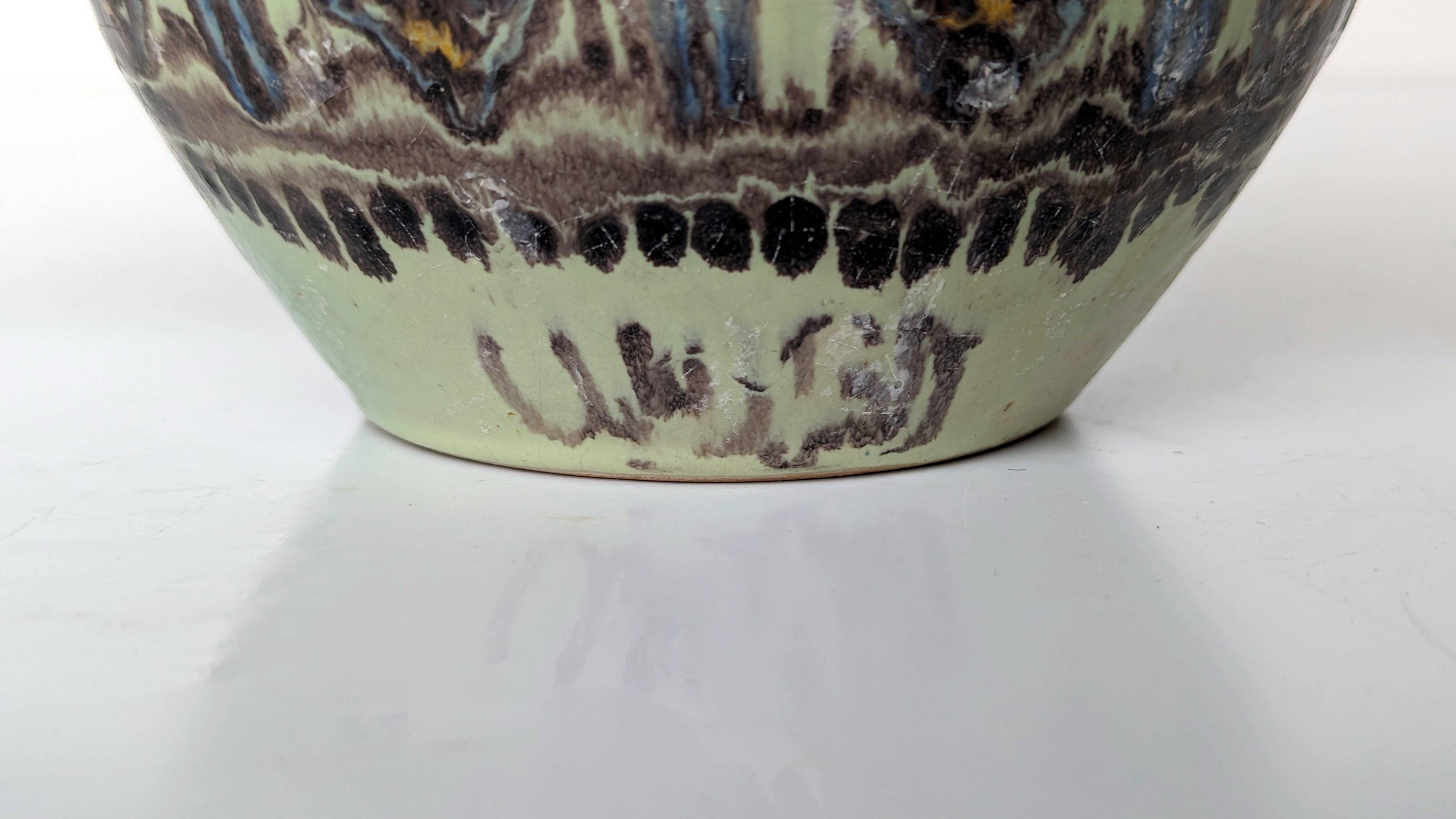 Polychrome ceramic vase in flowing enamel from Nabeul with mihrab decoration.