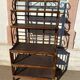 Wicker stand with scrolls shelf