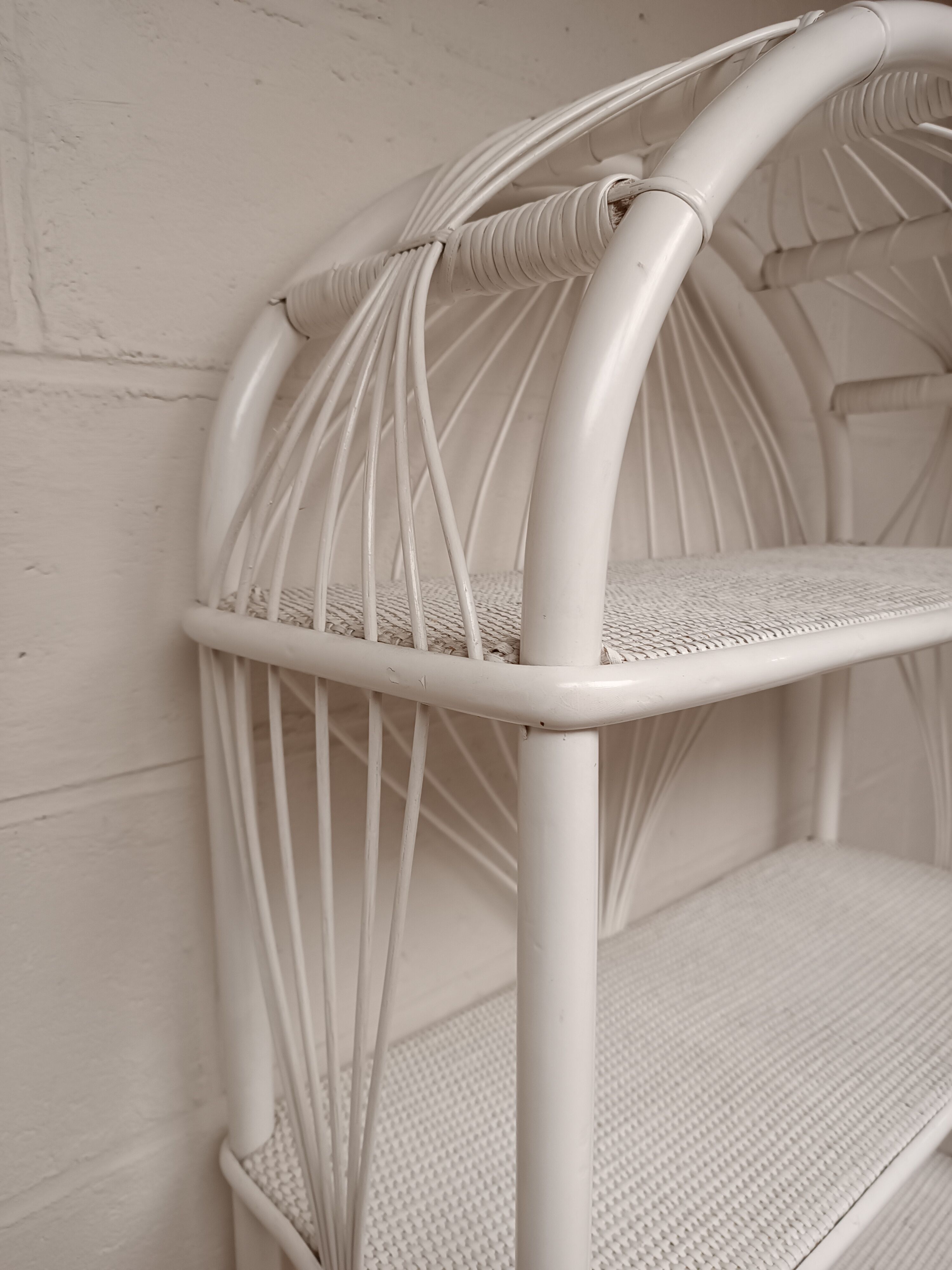 White lacquered rattan bookcase