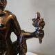 Large kerosene lamp mounted on bronze statue. Late nineteenth century
