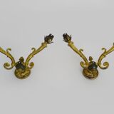 Paire d'appliques murales style Empire double feux en bronze