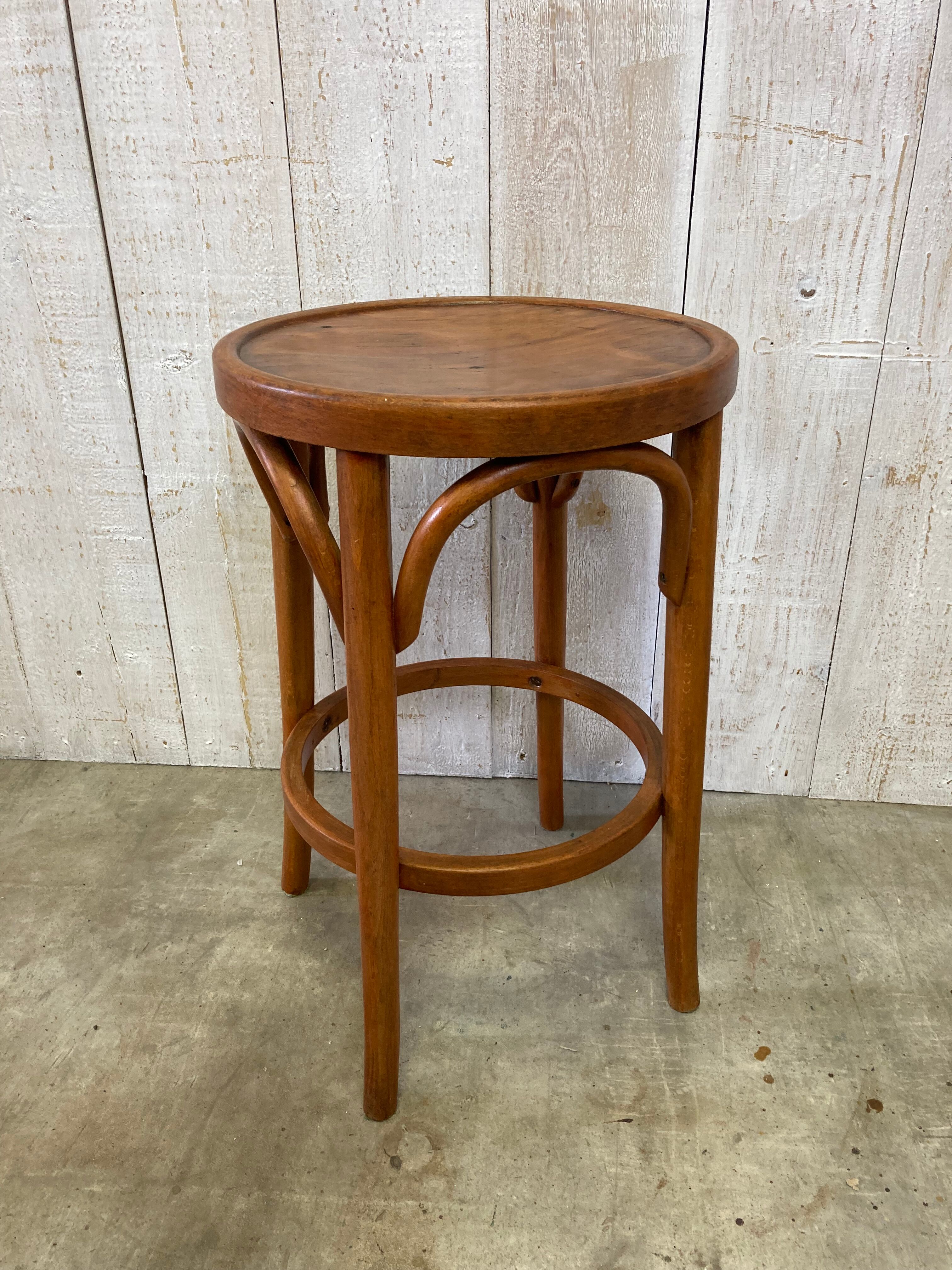 Curved wooden stool