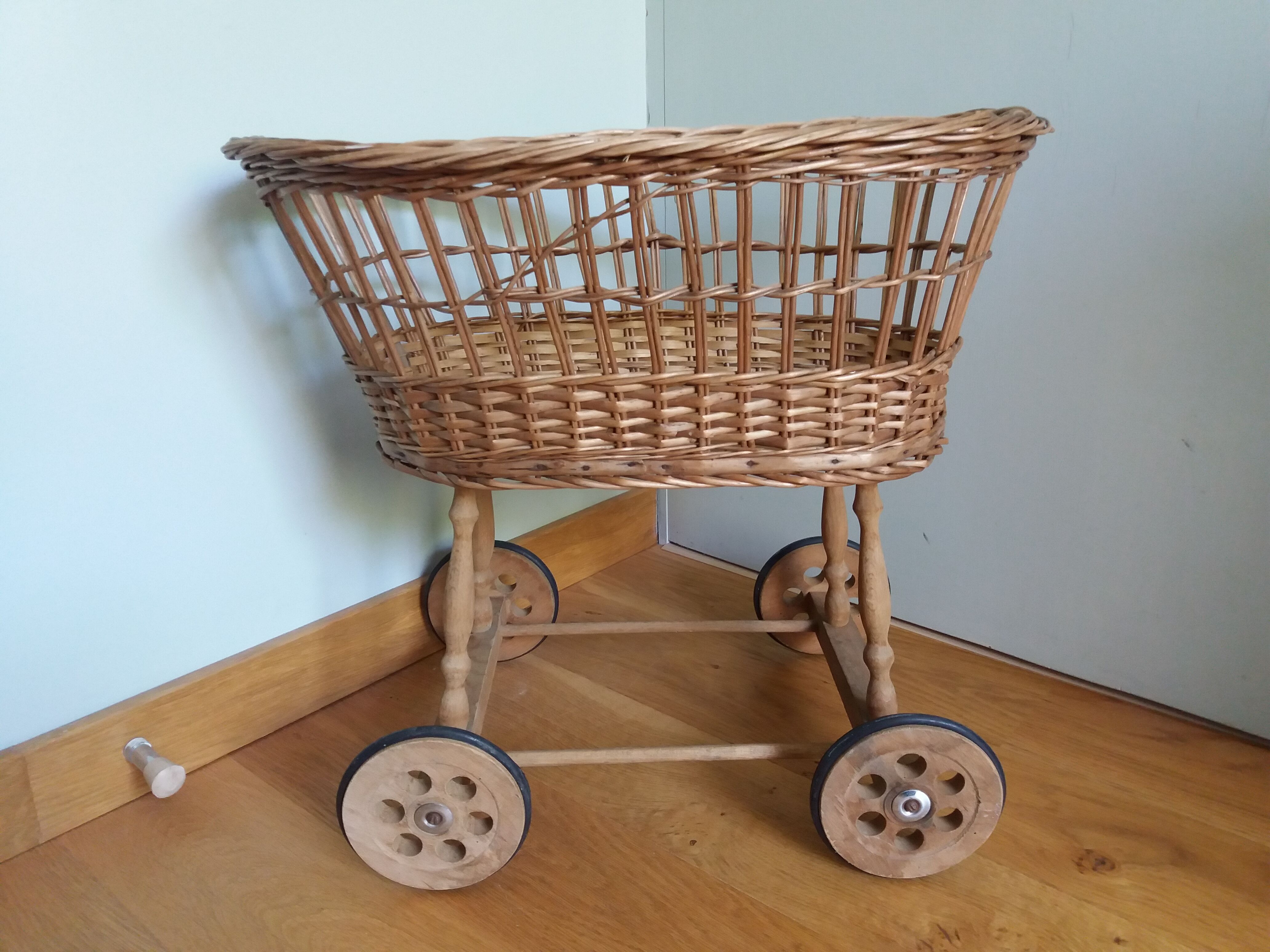 Wicker rattan doll cradle with wheels