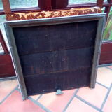 White veined black marble fireplace