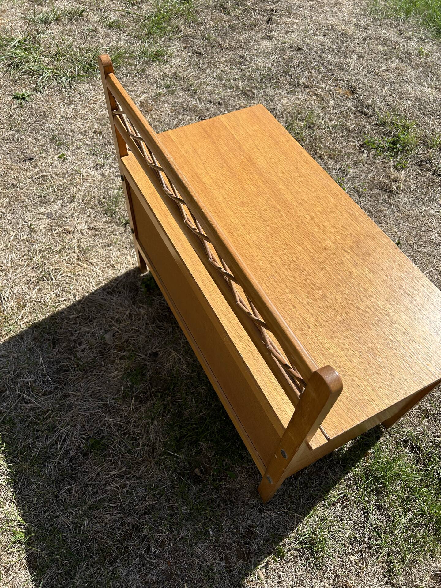 Vintage 1960s bank chest in light oak and rattan weaving.