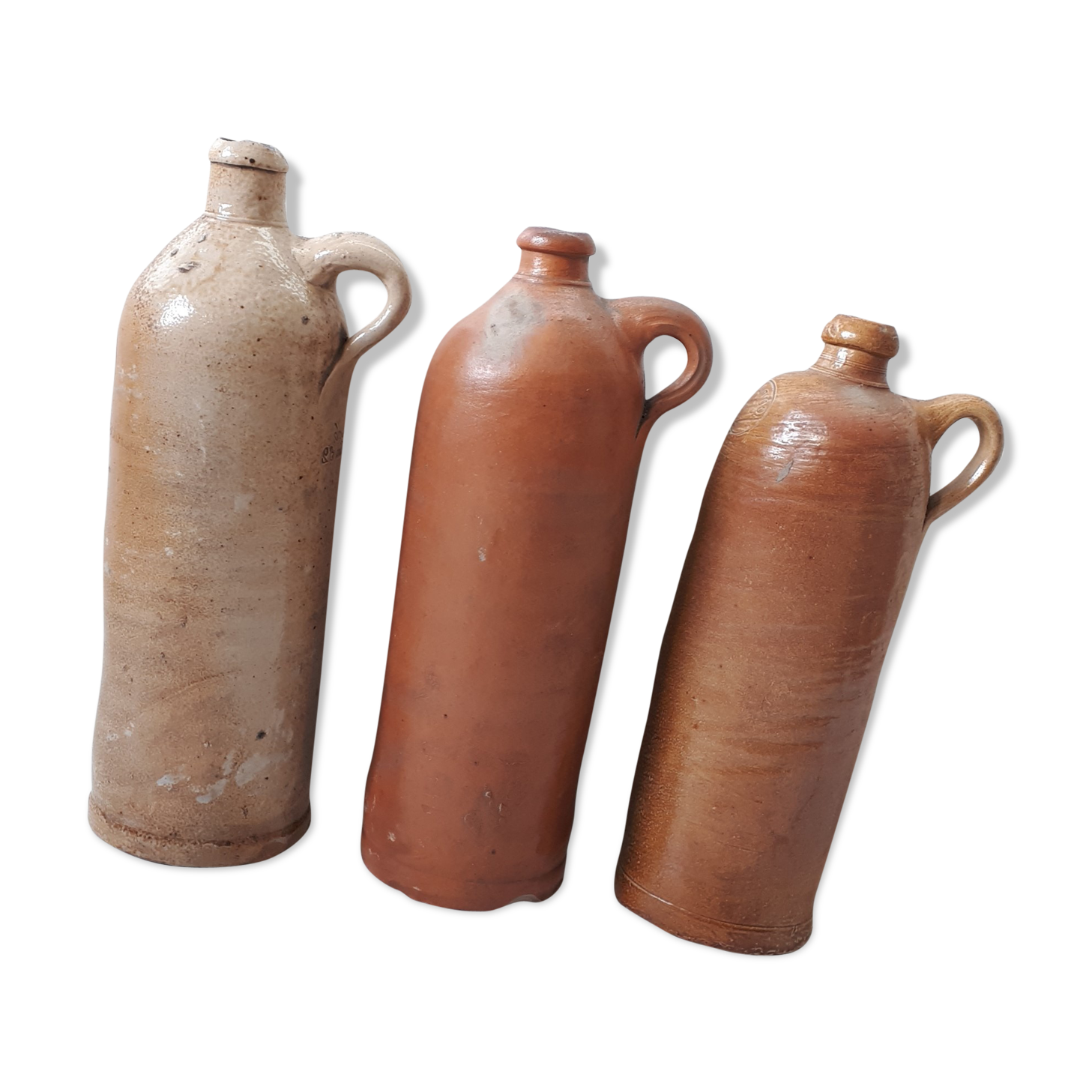 Trio of sandstone carafes with cove