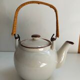 Flowered stoneware teapot with vintage rattan handle