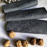 Suite of four napkins tinted in smoke grey