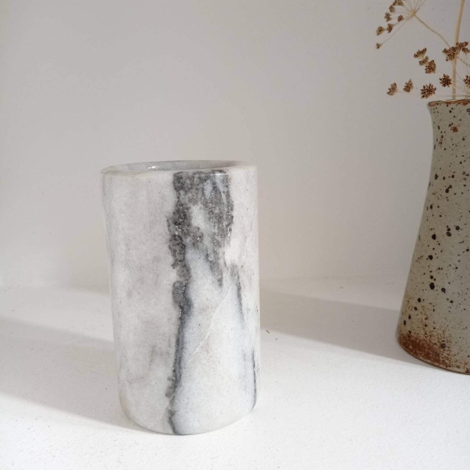 Cylindrical marble vase