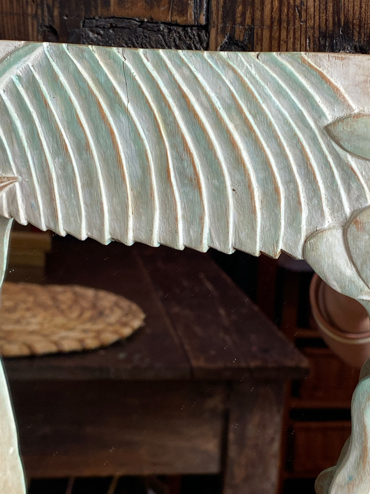 Carved wooden mirror