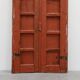 Large 17th century Monastery doors in terracotta lacquered oak, Portugal