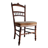 Antique chair turned wood sitting velvet flowers