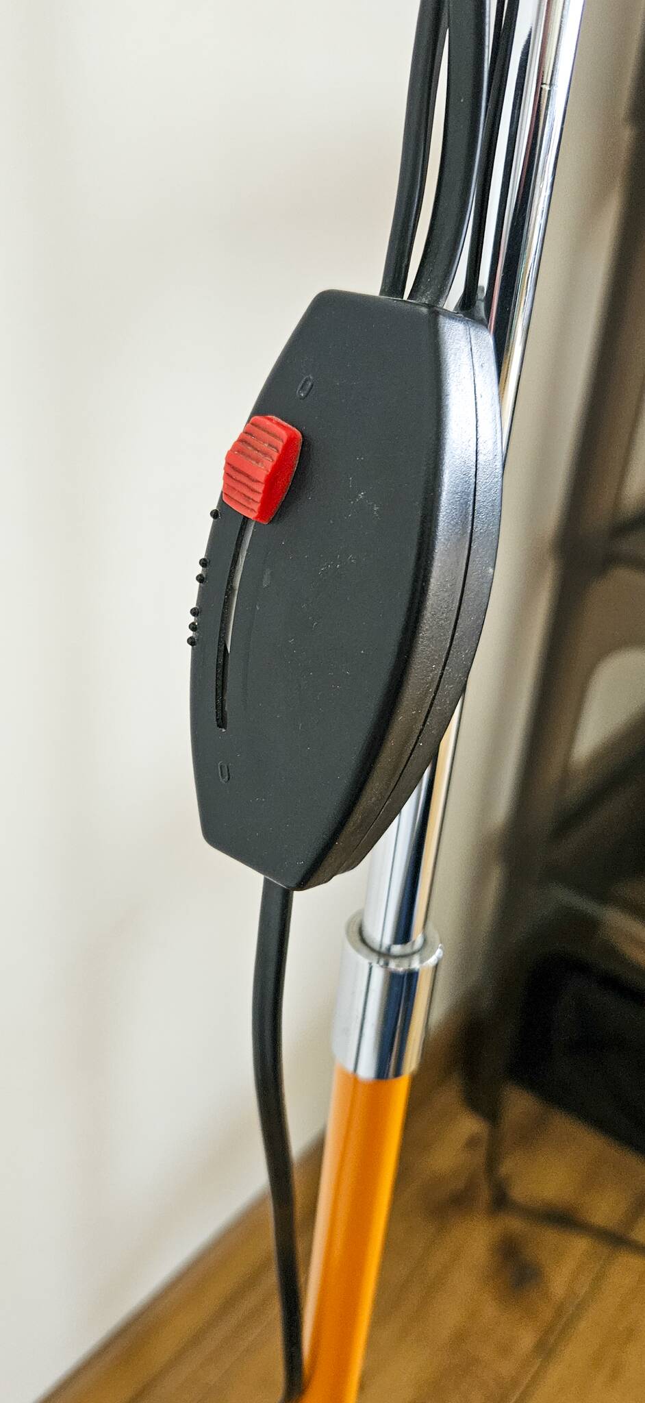 Vintage 1970s floor lamp with 2 spots, chrome, orange and black.