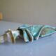 Surreal ceramic sculpture in relief signed to be identified.