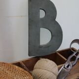 Panel letter in zinc