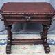 Ancient Flemish Gothic desk. Solid oak with richly carved dolphins.