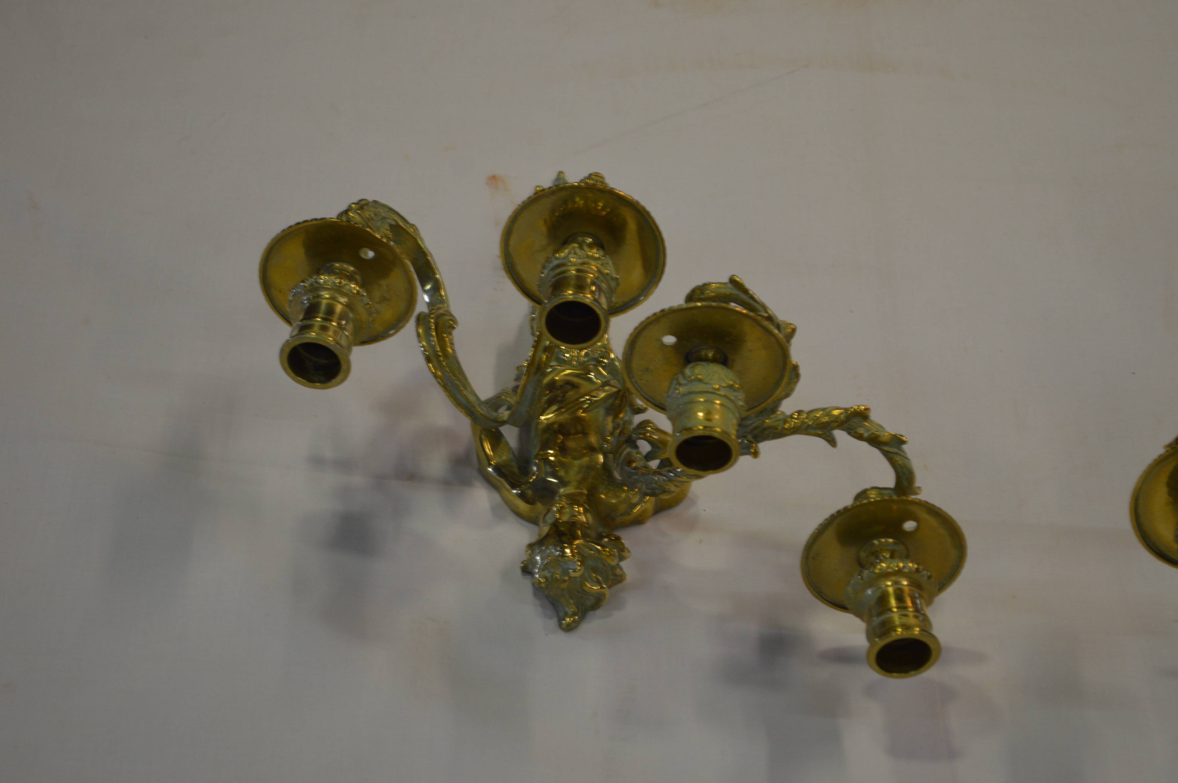 Louis XV style bronze sconces with cariatids
