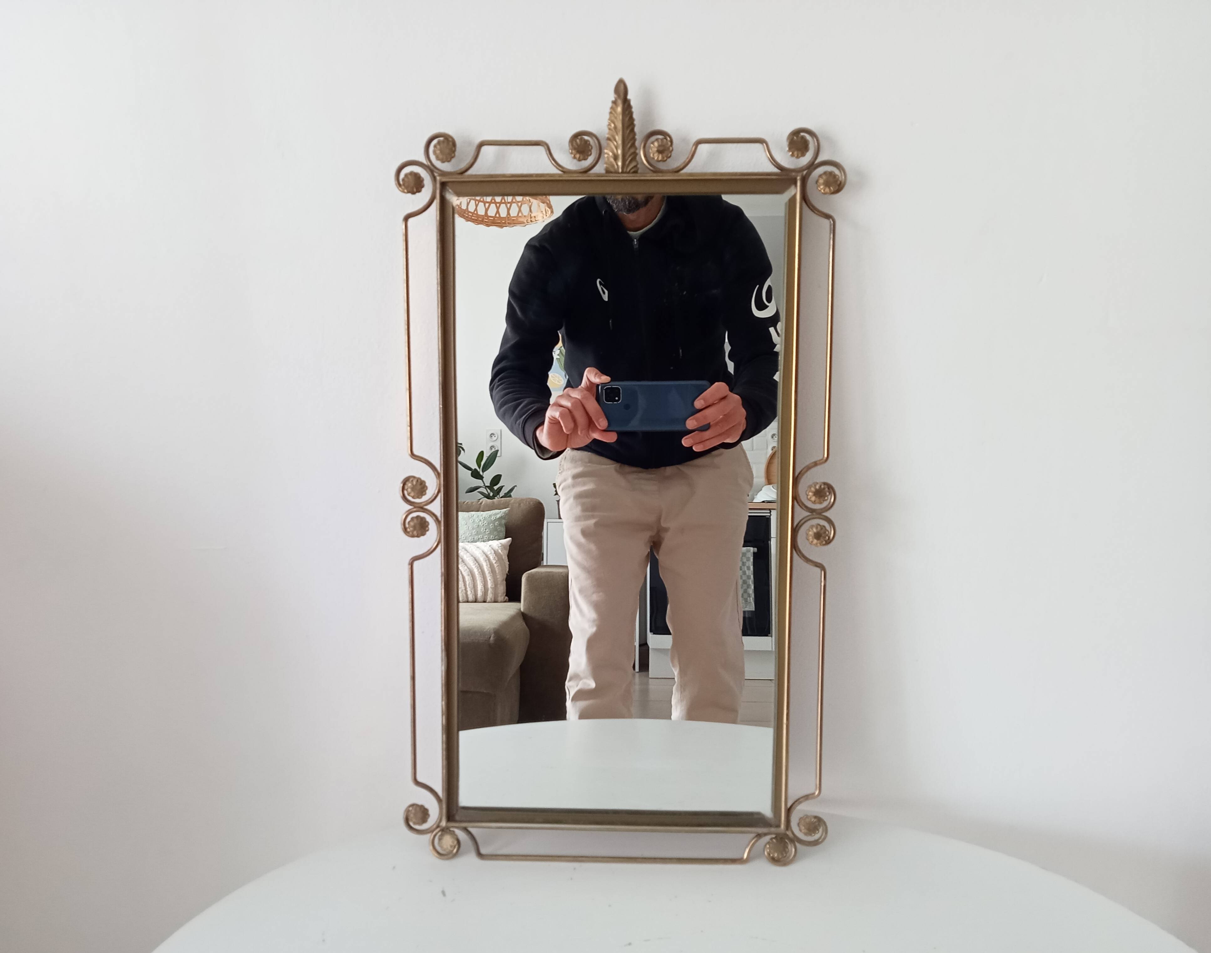 Vintage Hollywood Regency mirror from the 1950s.