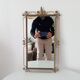 Vintage Hollywood Regency mirror from the 1950s.