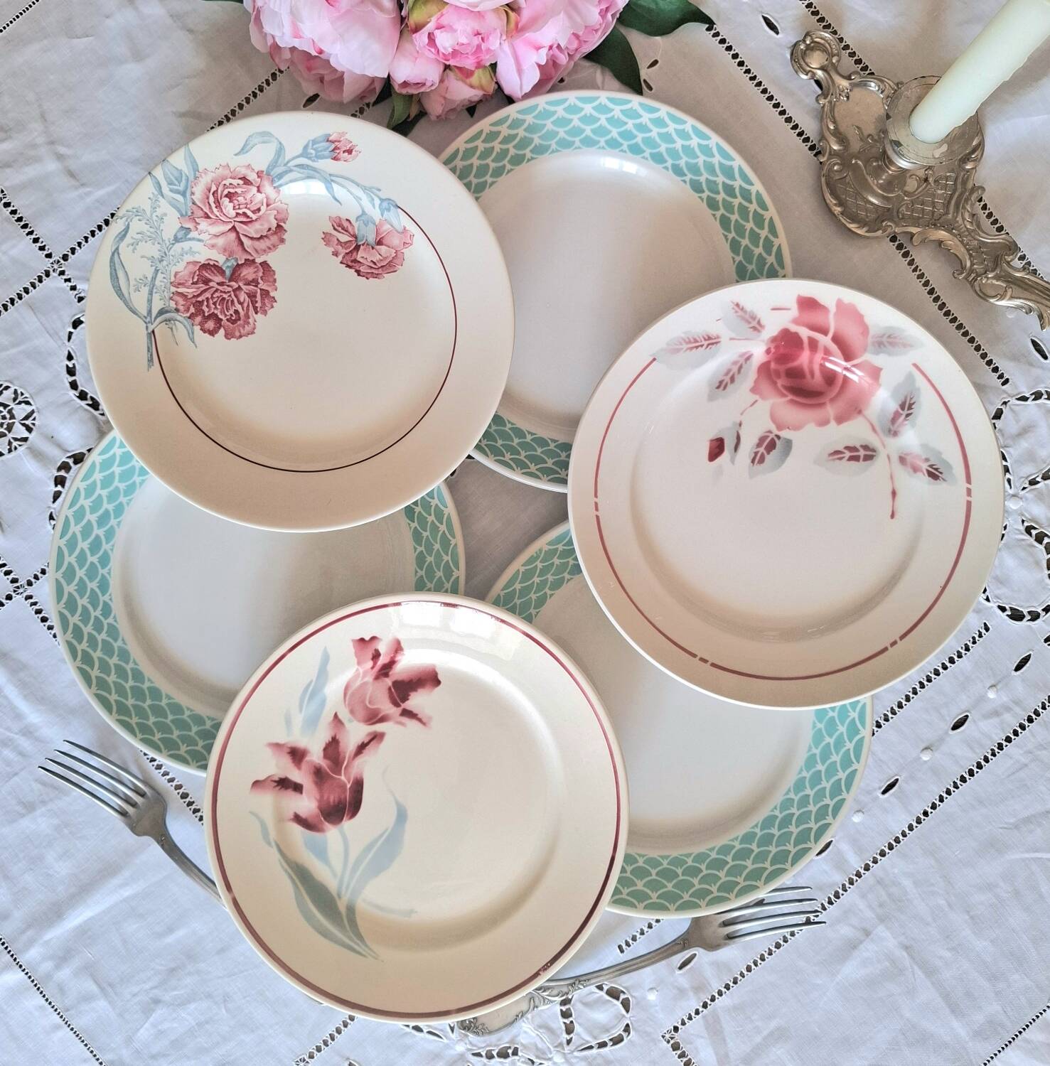 Mismatched antique flat plates in earthenware.