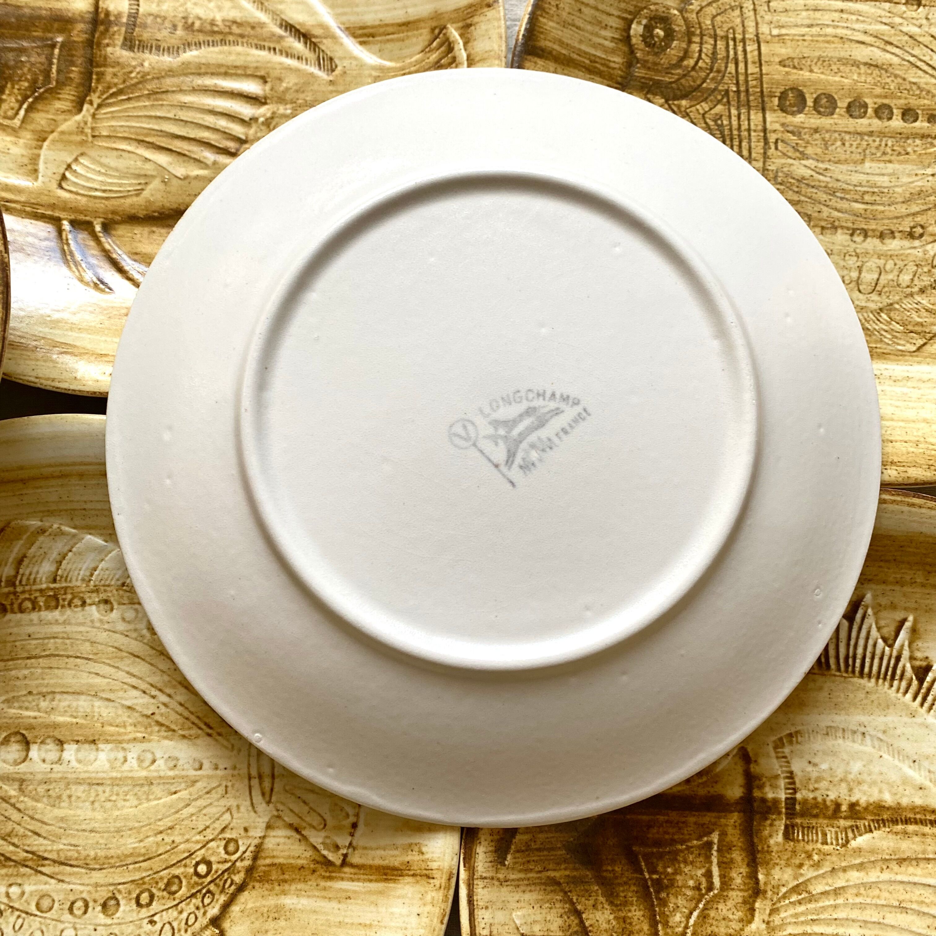 Longchamp dinner plates with fish decor