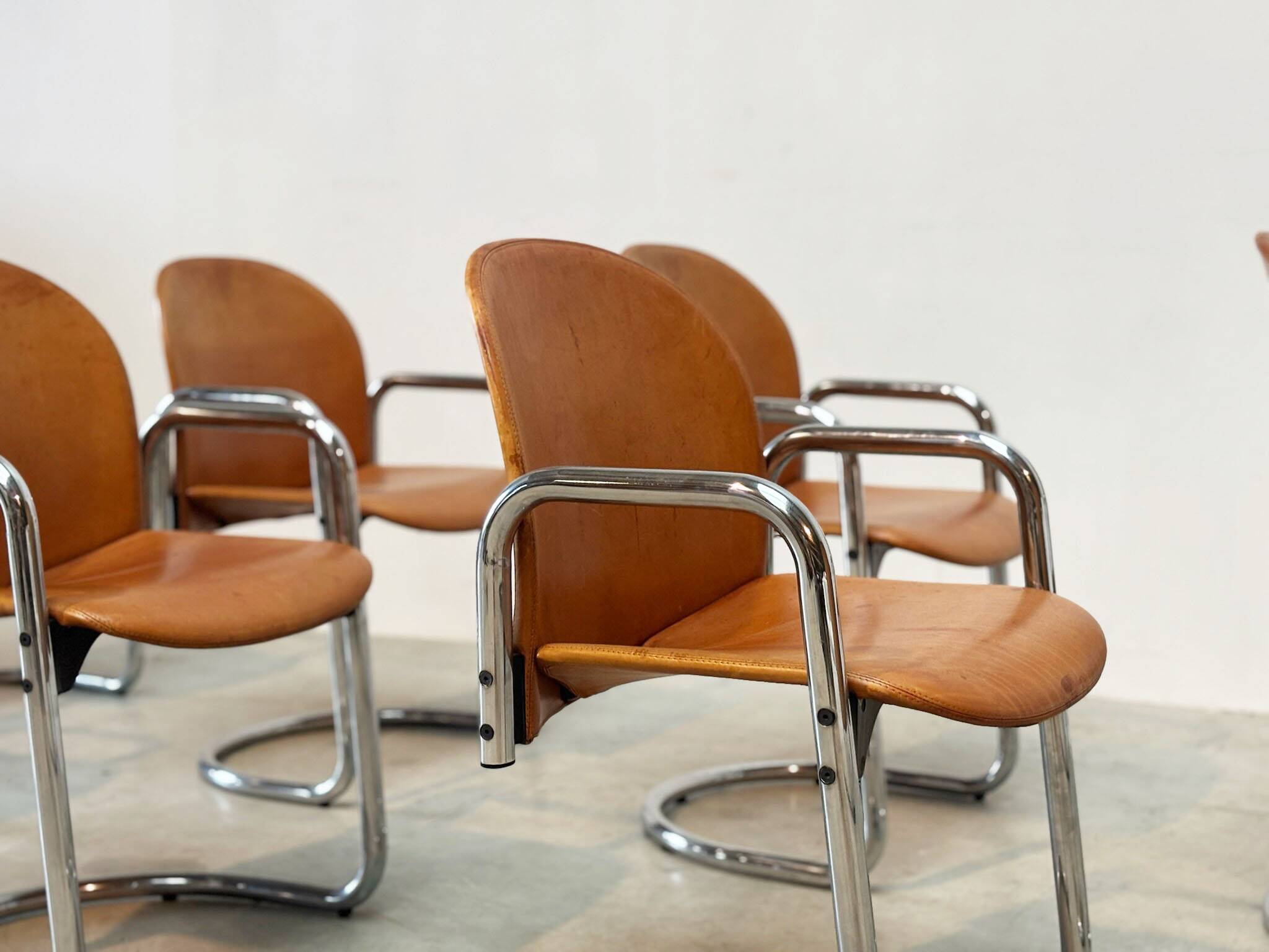 Set of eight cognac leather Dialogo Dessau dining chairs by Afra E Tobia Scarpa