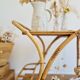 Antique rattan serving trolley with double shelves