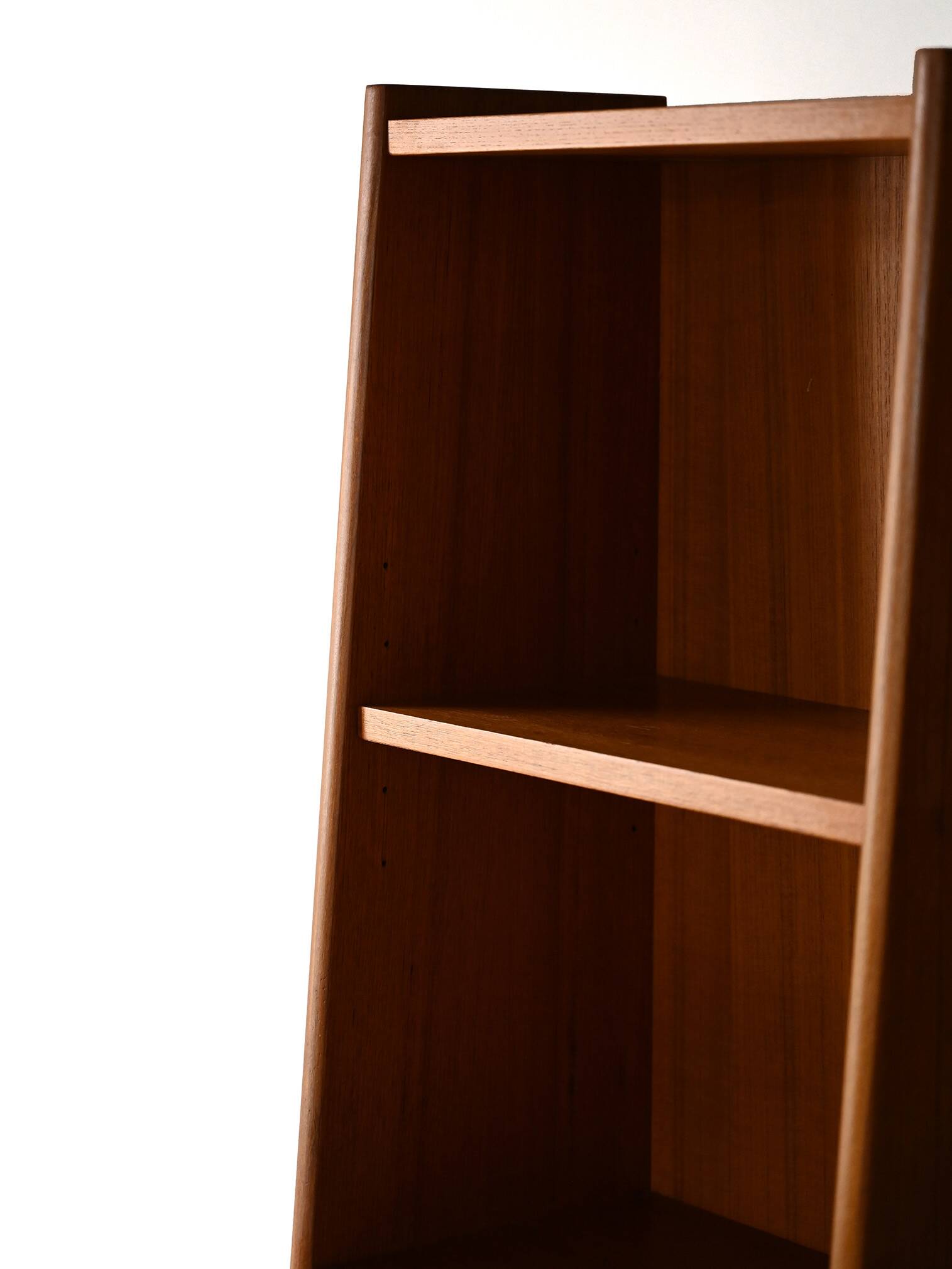 Fine teak bookcase with drawers