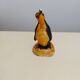 Small plaster penguin statue