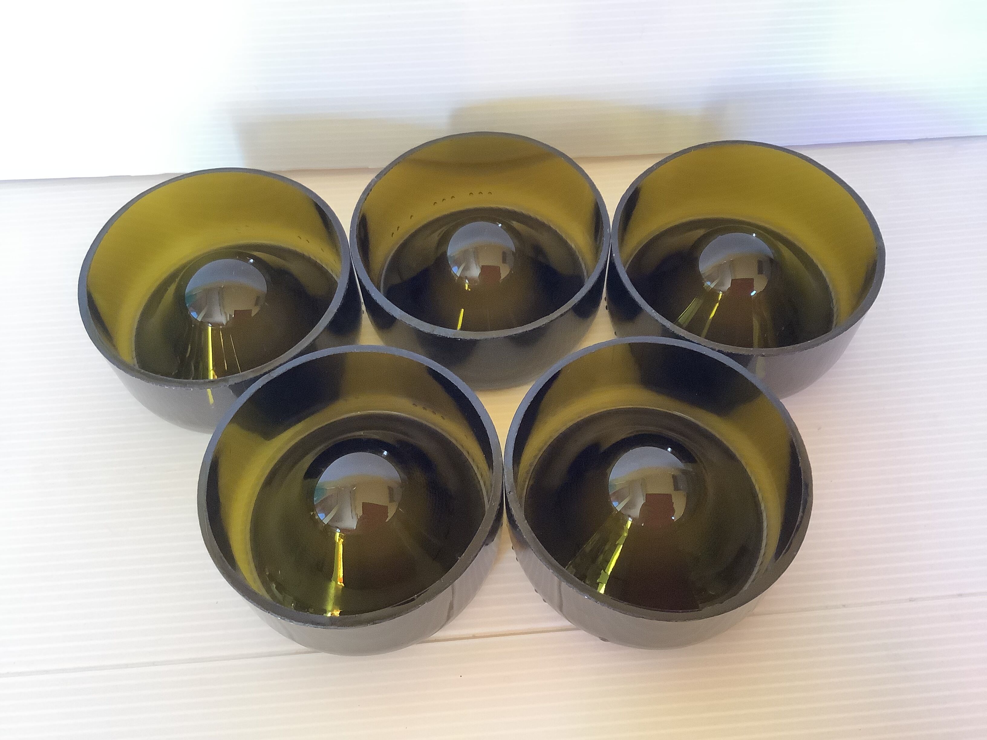 5 bottoms of wine bottles cut oenophile
