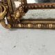 Louis XVI style mirror with parecloses in wood and gilded stucco, 19th century