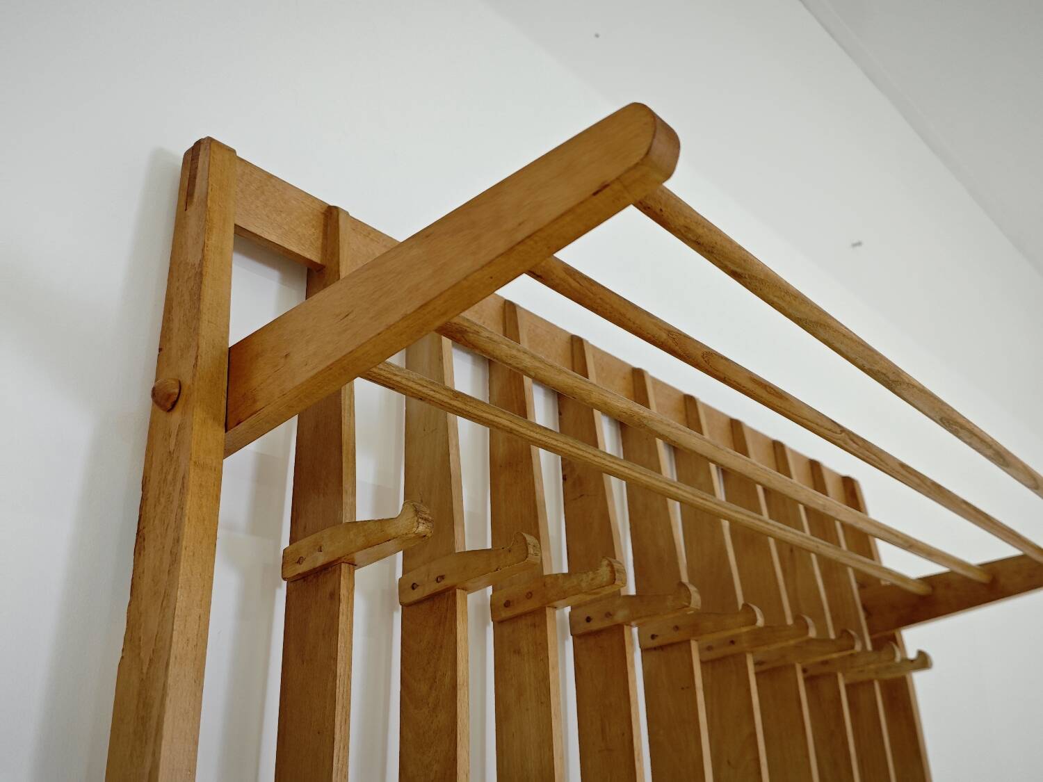 Wooden wall coat rack by Krasna Jizba