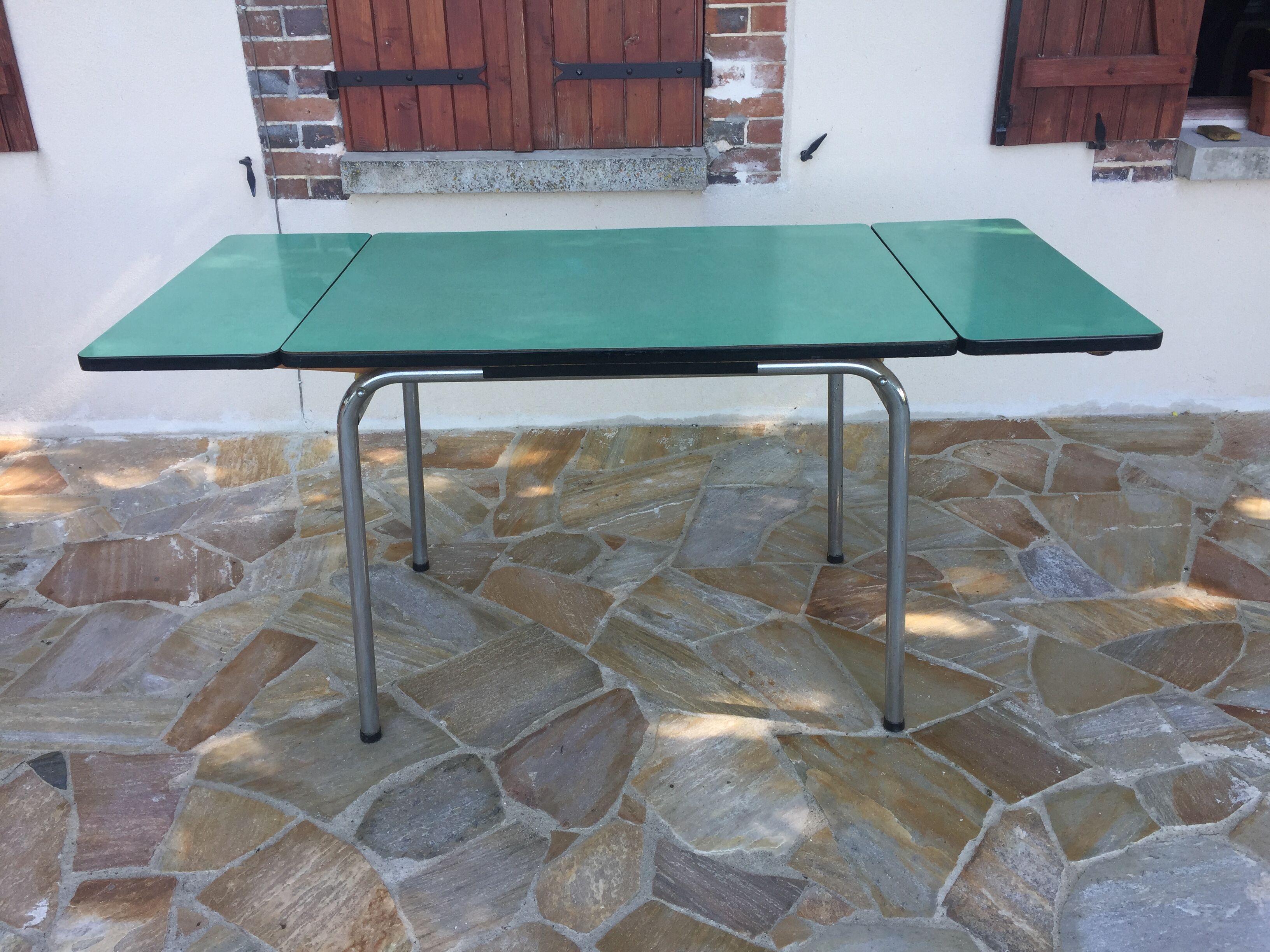 Formica green table with 2 extensions and a drawer years 60