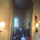 Large Louis Philippe mirror with a gilded wooden frame.