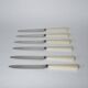 set of 6 small white bakelite knives 1960