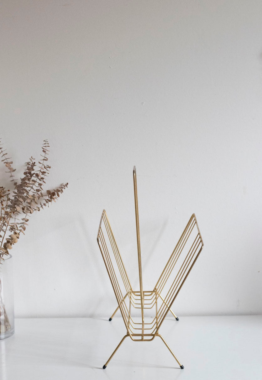 Vintage magazine holder in gold metal