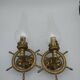 Brass wall sconces with nautical decor