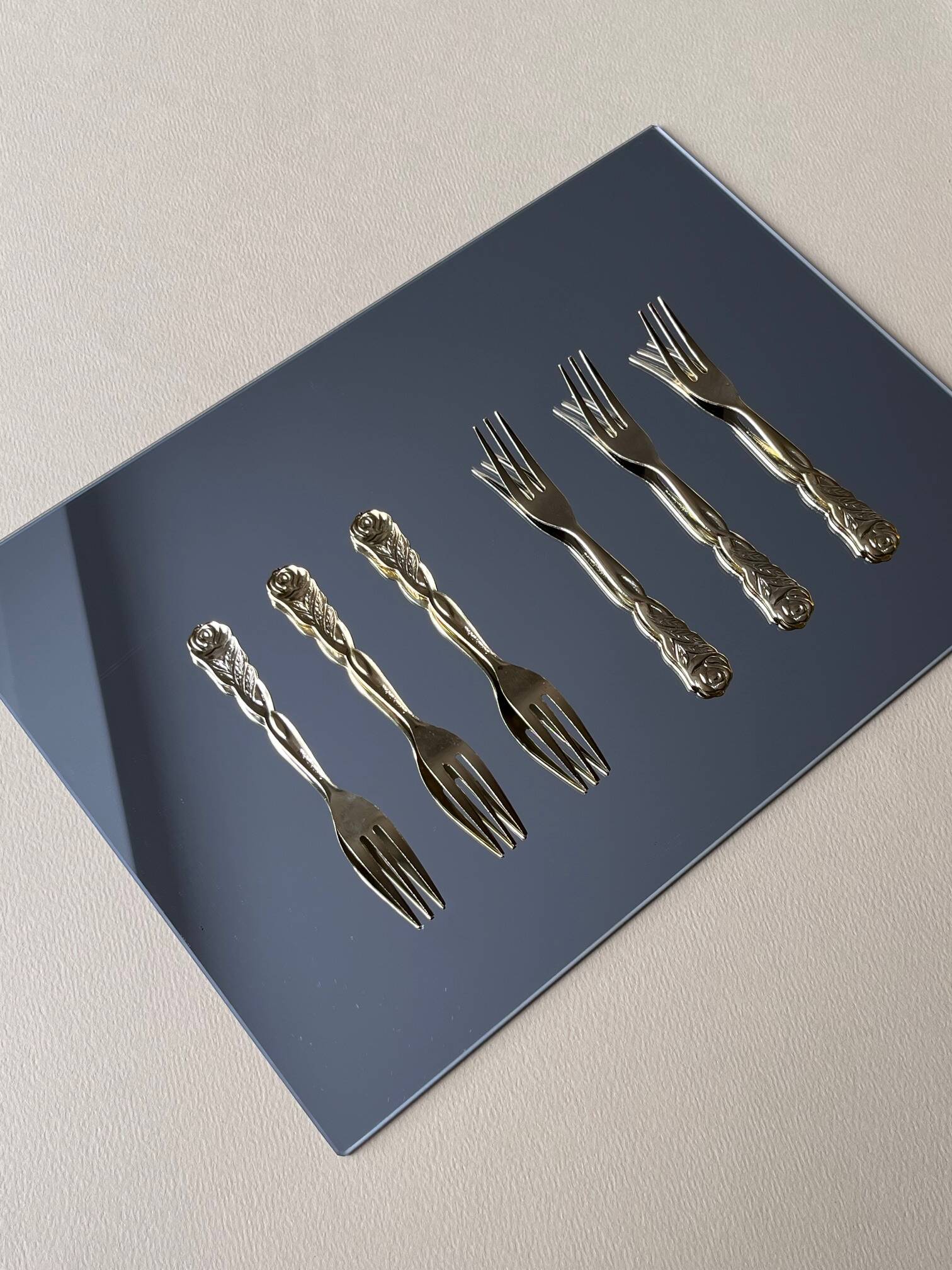 Vintage gold-plated appetizer forks