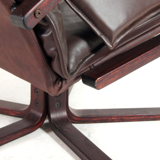 Fauteuil de salon pivotant vintage en palissandre et cuir design danois rétro années 70