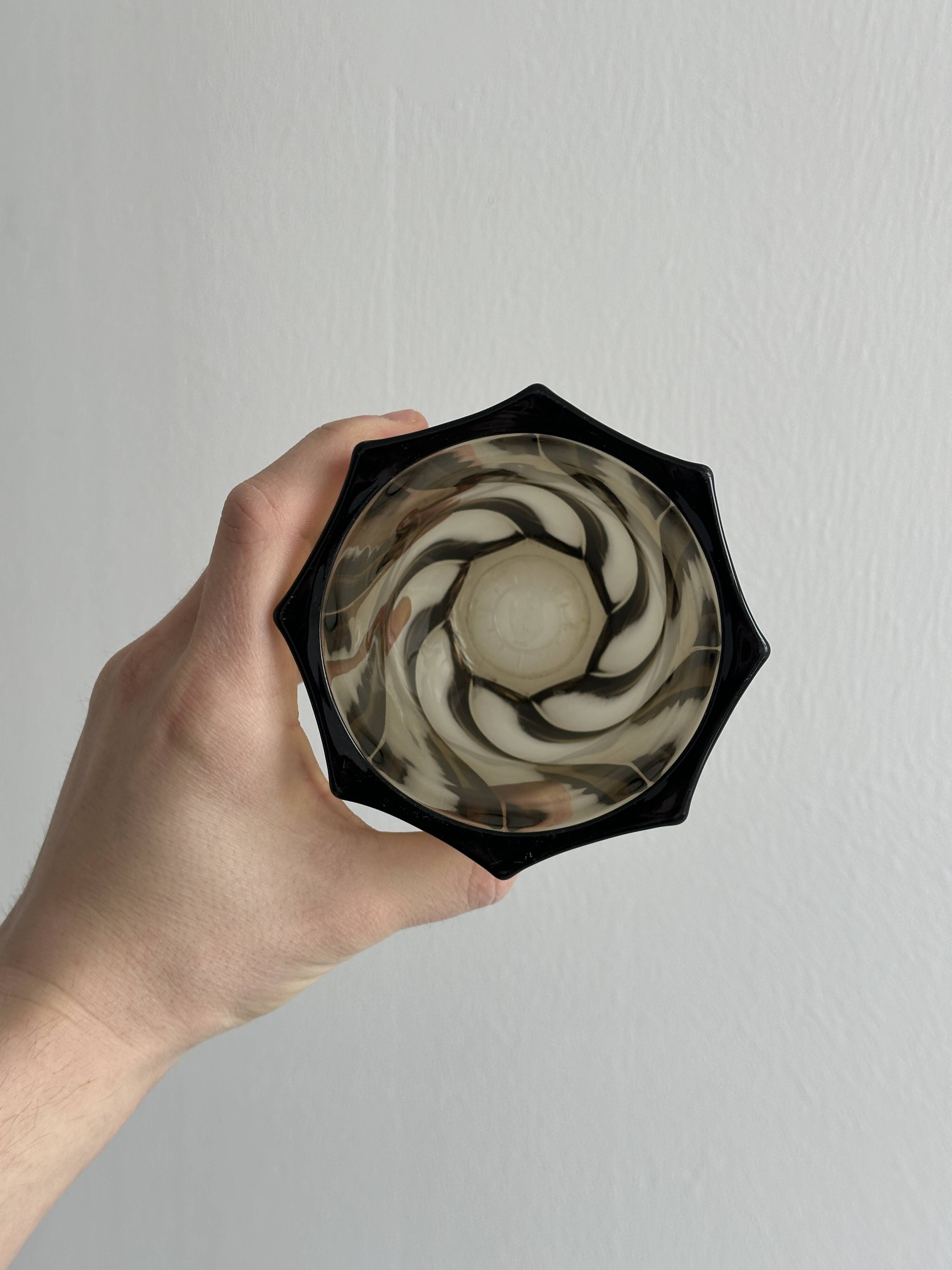 Smoked glass vase with twisted design