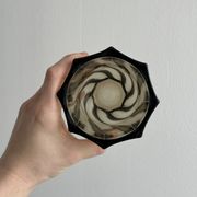 Smoked glass vase with twisted design