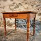 French vintage side table in cherry wood with a drawer.