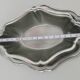 Patinated stainless steel sauceboat