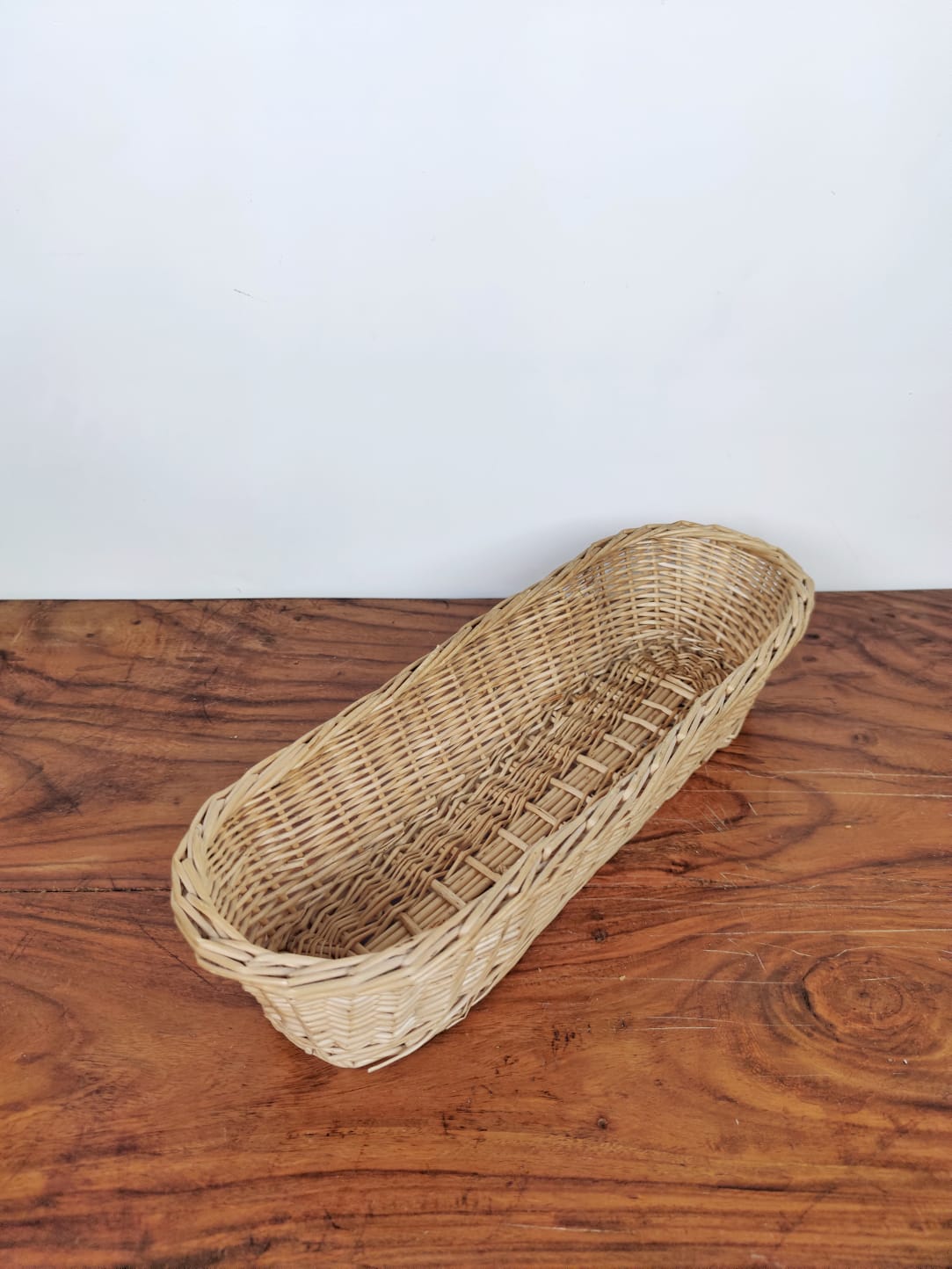 Beige wicker bread basket