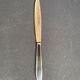 12 "Apollonox" fruit knives on silver metal support